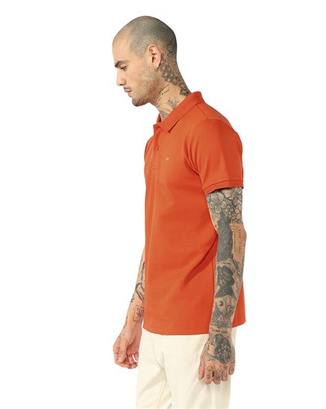 Regular fit polo with printed chest and sleeve text.
