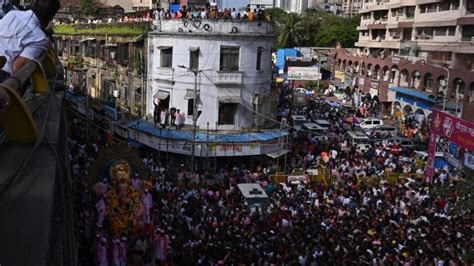 IN PHOTOS Devotees gather for procession of Lalbaugcha Raja other ...
