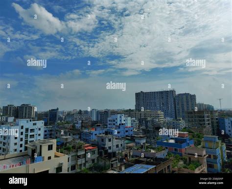 Bangladesh capital Dhaka city landscape on a sunny morning. Blue sky ...