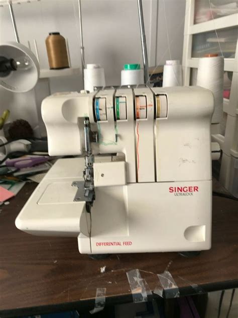 Image result for How to Thread Singer Ultralock