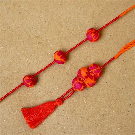Buy Handmade Kesari Potli Upcycled Fabric Bhaiya Bhabhi Rakhi With Roli ...