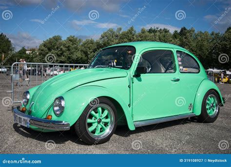Front View of Green Volkswagen Beetle Parked in the Street Editorial ...