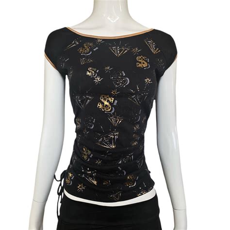 Women's Black and Gold T-shirt | Depop