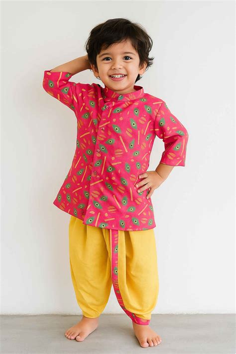 Vibrant Pink And Yellow Dhoti Kurta Set With Peacock Feather Print For ...