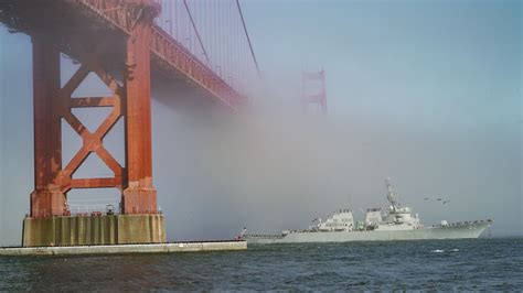 USS Fitzgerald (DDG 62) sails under the Golden Gate Bridge during the ...
