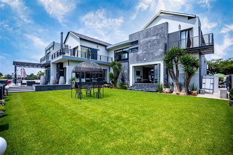 Exquisite Mansion on 12th Hole, Copperleaf Golf & Country Estate ...