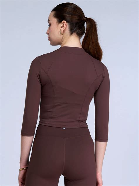 Brown Silhouette Zip Top – CAVA Athleisure Pvt Ltd