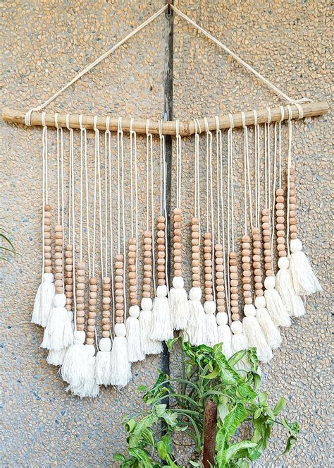 Get Wood Beads and Tassels Wall Hanging-White at ₹ 1499 | LBB Shop