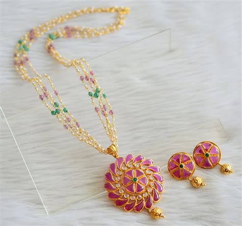 Gold tone multi color pearl chain with uncut ruby-green polki pendant ...