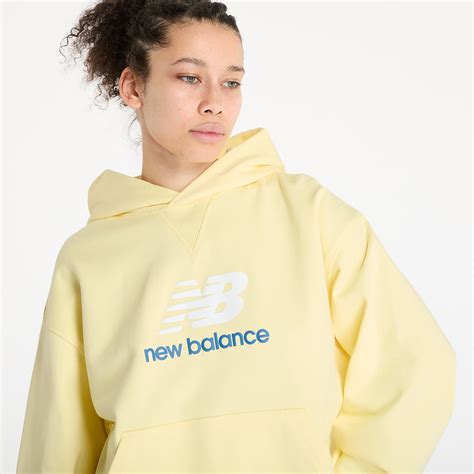 Women's hoodies New Balance Athletics French Terry Logo Hoodie Yellow ...