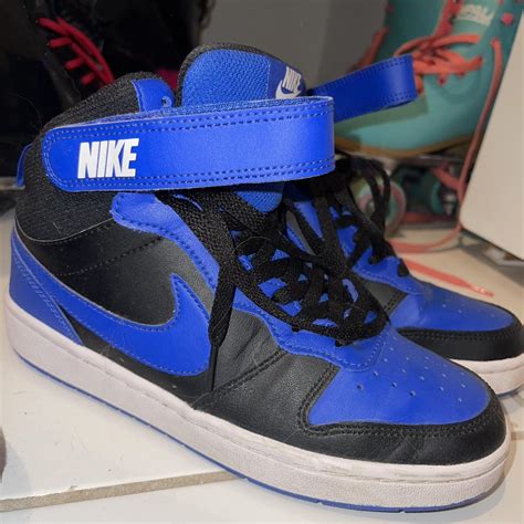 Blue and black Nike high tops. Worn only a couple of... - Depop