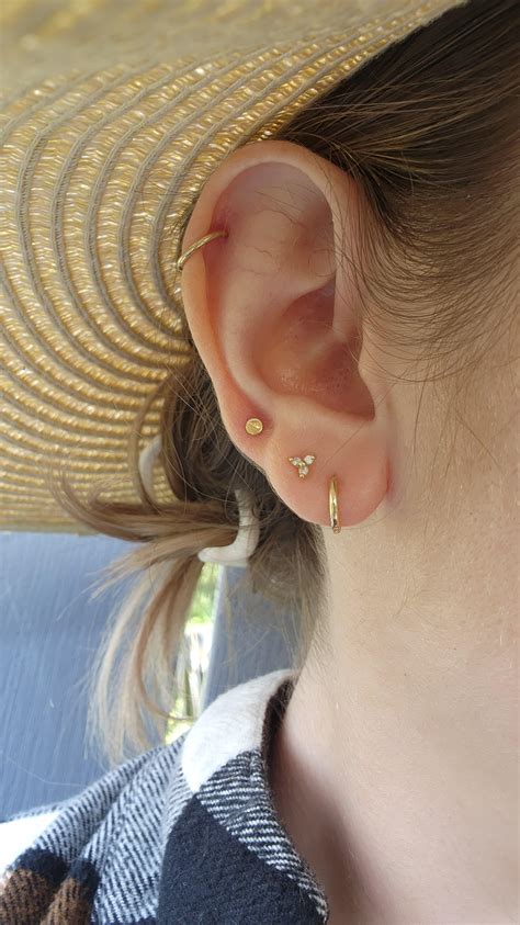 Current set up, just pierced my third lobe. Simple but I like it ...