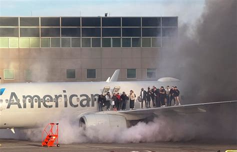 American Airlines flight catches fire at Denver airport - ABC News