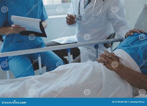 Injured Patient Showing Doctor Broken Wrist and Arm with Bandage in ...