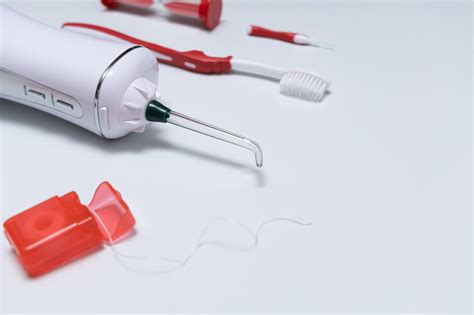 Waterpik vs. Flossing. What’s Better? | Eau Claire Park Dental