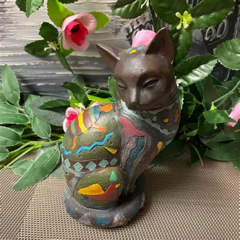 Small solid ceramic cat statue(s)