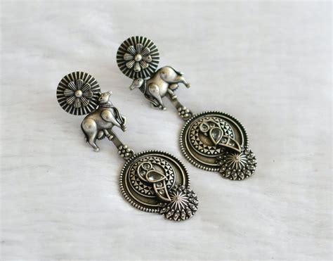 Silver tone white peacock-cow long earrings dj-46419 – dreamjwell