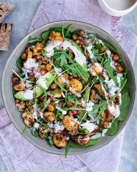 Roasted Cauliflower Salad with Tahini Dressing - Six Hungry Feet