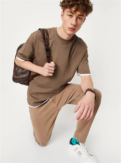 Buy Men Solid Relaxed Fit T-shirt Online at just Rs. 399.0 ...