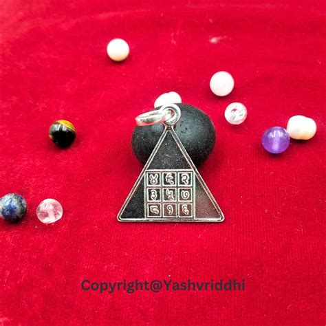 Pyra Yantra Silver Locket– YASHVRIDDHI