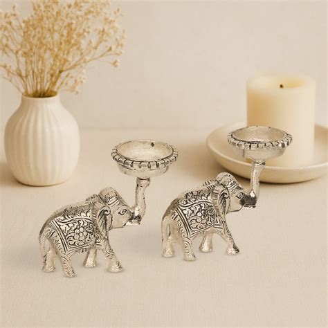 REGAL ELEPHANT CANDLE HOLDER PAIR – Utsovia