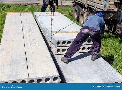 Installing Concrete Slabs at a Construction Site at Home Stock Photo ...