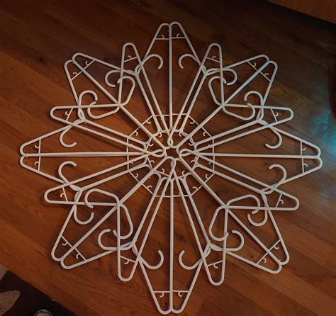 How to make a christmas star with hangers 8 steps with pictures – Artofit