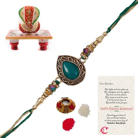Designer Stone Rakhi with Lord Ganesha Marble Chowki and Roli Tikka ...