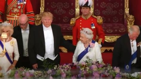 Donald Trump fist bumps Queen Elizabeth and pats her on London visit ...