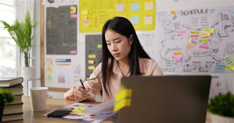 Woman Writing on Papers 3120806 Stock Video at Vecteezy