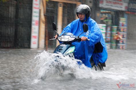 Why does flooding occur every time it rains in HCMC?