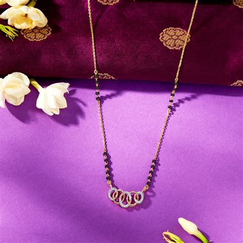 Buy Angelic Glow Gold Diamond Modern Mangalsutra For Woman Online at ...