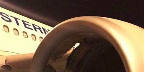 东航悉尼飞上海客机发动机故障 引擎罩被击出大洞_手机新浪网