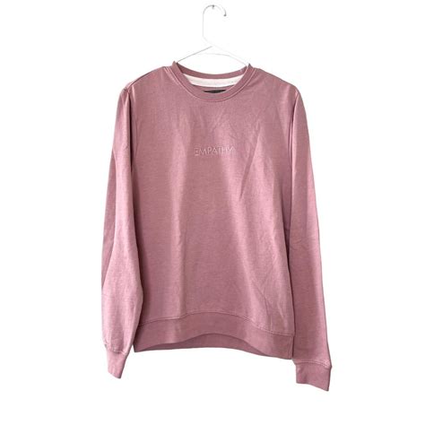 Pink crewneck sweatshirt with “empathy” embroidered... - Depop