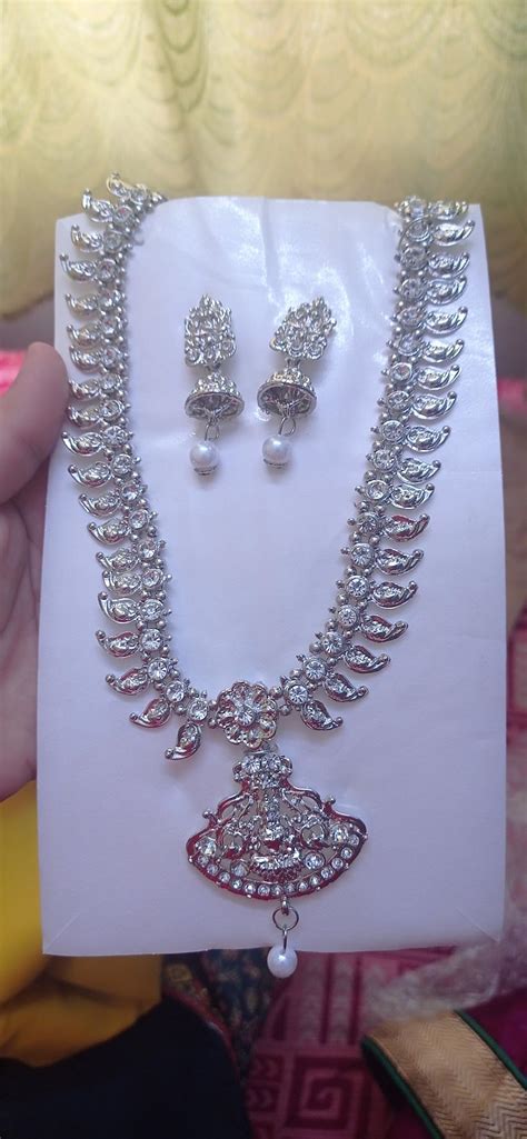 Sukkhi Adjustable Rhodium Plated Silver AD Stones Long Temple Necklace ...