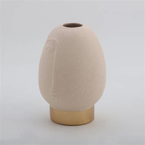 Buy Marshmallow Ceramic Human Face Vase from Home Centre at just INR 799.0