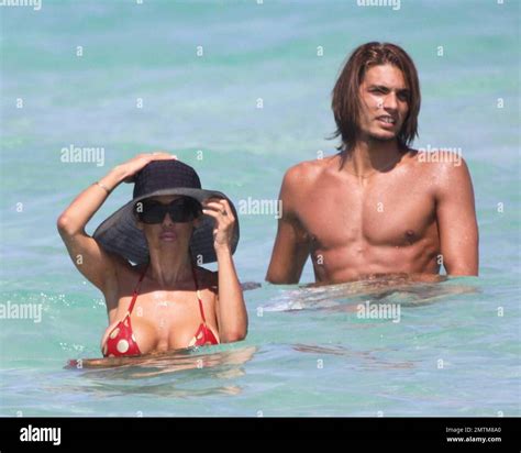 Playboy Playmate Shauna Sand spends the day on Miami Beach with her new ...