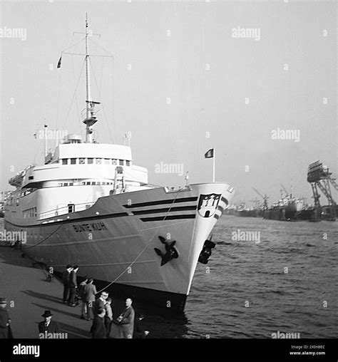 The seaside resort ship Bunte Kuh is depicted. The cranes of the ...