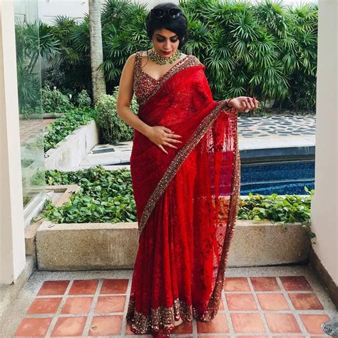 Look Hot in a Red Saree With Golden Border This Wedding Season
