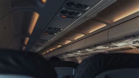 This Is The Reason Flight Attendants Dim The Lights On An Airplane