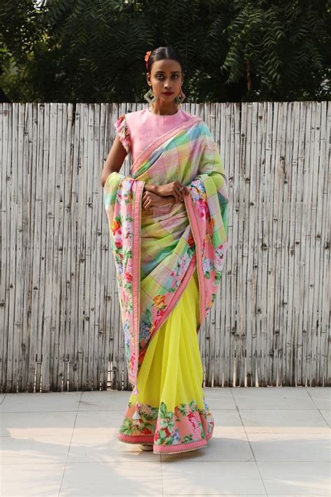 Plaid saree with solid lime green georgette in inner wrap with appliqu