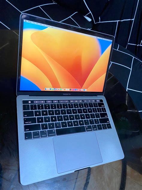 Image result for MacBook Pro 13-Inch with Touch Bar Processor