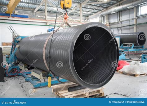 The Process of Threading a Large Plastic Pipe. Factory for the ...