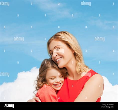 hugging mother and daughter Stock Photo - Alamy
