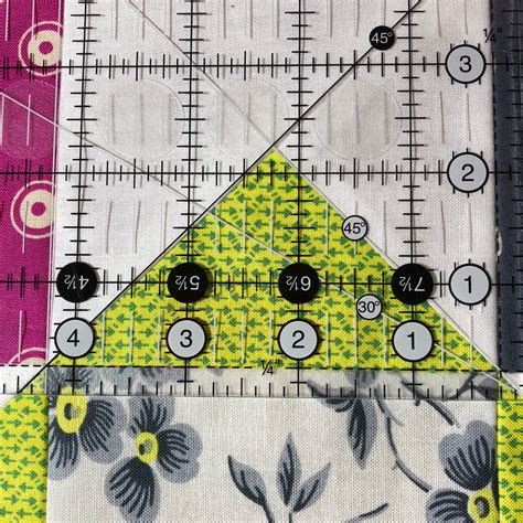 How to Use a Quarter Square Triangle Ruler for Quilting 的图像结果