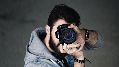 Download wallpaper 1920x1080 photographer, camera, man, lens, shooting ...