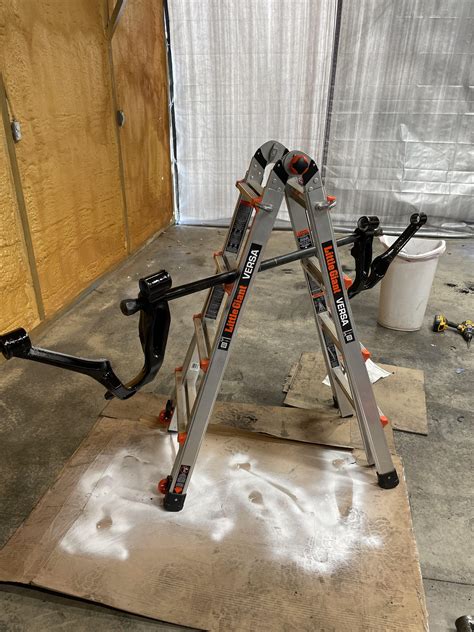 Tip of the day: use your torsion bar to hold your lower control arms in place while you paint ...