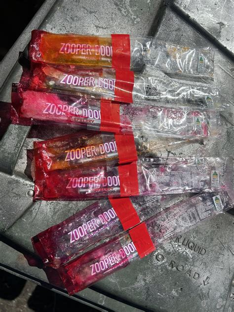 Bought a bag of zooper doopers and a bunch of em had leaked out and had this red tape around ...