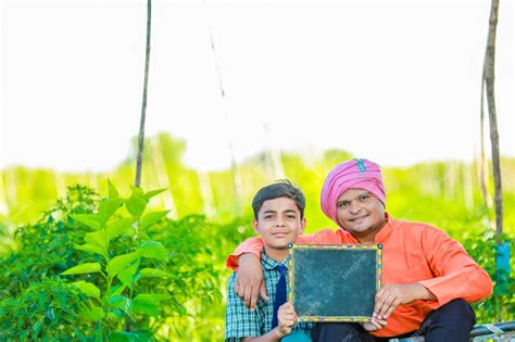 Premium Photo | Cute indian farmer child in school uniform with his ...