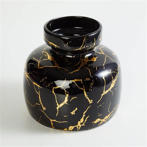 Buy Novelty Ceramic Beaker Vase from Home Centre at just INR 2499.0